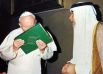 Jean-Paul II embrasse le Coran